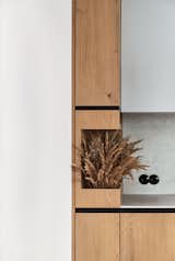Kitchen, Concrete Counter, Colorful Cabinet, Wood Cabinet, and Concrete Backsplashe  Photo 4 of 25 in Love Apartment by Liubov Lazoriv