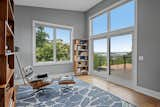 Living Room, Floor Lighting, Recliner, Medium Hardwood Floor, and Chair Sitting Area  Photo 10 of 21 in Custom Modern with Skyline Views in Belknap Lookout by Kellie Kalish