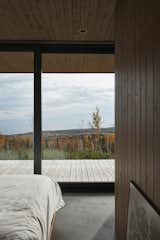 Bedroom, Bed, Recessed Lighting, and Concrete Floor  Photo 18 of 42 in Résidence du Rang Ste-Mathilde by Jérôme Lapierre Architecte