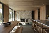 Living Room, Bench, Sofa, Recessed Lighting, Chair, Concrete Floor, and Wood Burning Fireplace  Photo 12 of 42 in Résidence du Rang Ste-Mathilde by Jérôme Lapierre Architecte