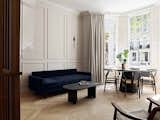 Living Room, Sofa, Bench, Light Hardwood Floor, Chair, Ottomans, Coffee Tables, and Wall Lighting Living Room   Georgios Apostolopoulos’s Saves from Knightsbridge Apartment
