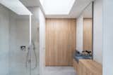 Bath Room, Travertine Floor, Stone Counter, and Wood Counter  Photo 13 of 23 in Villa in Budapest by Luca Mudry