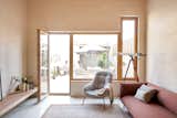 Living Room, Sofa, Concrete Floor, and Ottomans  Photo 2 of 12 in Casa Mariela by Viva | Casas Sostenibles
