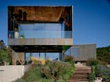 Exterior, Flat RoofLine, Stone Siding Material, Metal Siding Material, Glass Siding Material, Metal Roof Material, and House Building Type T23 Villa  Photo 1 of 16 in RAPA Architects call for more green in Budapest's urban jungle. by RAPA Architects