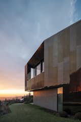 Exterior, House Building Type, Metal Siding Material, Tile Roof Material, and Metal Roof Material T23 Villa - Sunset  Photo 9 of 16 in RAPA Architects call for more green in Budapest's urban jungle. by RAPA Architects