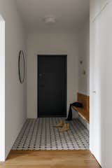 Hallway, Ceramic Tile Floor, and Light Hardwood Floor  Photo 14 of 24 in R Apartment by Olga Chut