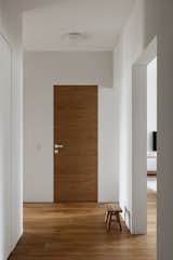 Hallway and Light Hardwood Floor  Photo 12 of 24 in R Apartment by Olga Chut