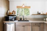 Modern, open kitchen in Japandi design. 