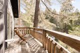 Private, tranquil balcony with tree views. Perfect for sipping coffee while listening to the stillness of the mornings here.