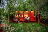 A Bright-Red Tiny Home Blossoms in Warsaw