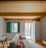In the new house, the wall separating the kitchen and dining/living room has been knocked down to create a larger, more roomy and brighter. As for the door and window, they have not moved from their original positions.