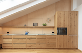Owner Kristine likes to spend her weekend mornings in the kitchen, under the skylight.