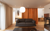<span style="font-family: Theinhardt, -apple-system, BlinkMacSystemFont, &quot;Segoe UI&quot;, Roboto, Oxygen-Sans, Ubuntu, Cantarell, &quot;Helvetica Neue&quot;, sans-serif;">“The curtain allows the space to be opened up or closed off in all kinds of different ways, and gives it more warmth and better sound-proofing,” says Vibeke.</span>