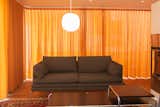 “We love the way the hand-made fabric brings a kind of handcrafted feel into the space, while the natural materials fit beautifully with the wooden surfaces,