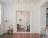 The custom-made terrazzo floor with its striking red pigment was made by “Nicos”, a local artisan. He and his team throw the cement, then throw the pebbles, then sand the whole floor five times.