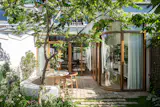 With a Wall of Curved Glass, This “Boxy” Utrecht Home Finally Found Its Flow