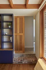 Kids Room, Neutral Gender, Family Room Room Type, Bookcase, Bench, Storage, Brick Floor, Shelves, and Medium Hardwood Floor  Photo 8 of 18 in Riversdale Kyneton by Cameron Greiner