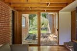 Kids Room, Bookcase, Family Room Room Type, Medium Hardwood Floor, Chair, and Brick Floor  Photo 9 of 18 in Riversdale Kyneton by Cameron Greiner