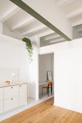 Living Room, Medium Hardwood Floor, and Wall Lighting  Photo 6 of 33 in Refurbishment in Barcelona by Albert Montilla