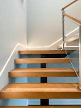 Staircase, Wood Tread, Wood Railing, and Glass Railing  Photo 5 of 11 in Before & After: This Staircase Gets a Contemporary Revamp by Loren Wood Builders