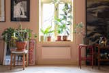 Living Room, Pendant Lighting, Bar, and Light Hardwood Floor The apartment is filled with contemporary Scandinavian art.   Photo 7 of 11 in Scandinavian Hideaway by Torstein Bjorklund