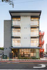 Exterior Sited on a postage-stamp sized lot at a prime corner of one of San Diego’s most vibrant neighborhoods, Lofts provides 15 high-volume but simple living spaces over a ground level with parking and a hybrid Shopkeeper unit.   Photo 1 of 11 in 7th & Robinson by Arlen Hizon