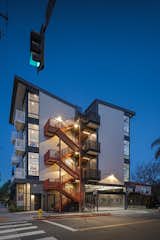 Exterior and Apartment Building Type Stairs transition from enclosed to the east and open and celebrated to the west.  Photo 5 of 11 in 7th & Robinson by Arlen Hizon