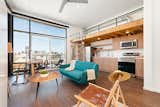 Living Room The loft units are 12’ tall spaces with all support gathered to one side into a bar.   Photo 8 of 11 in 7th & Robinson by Arlen Hizon