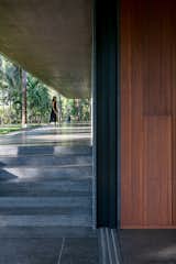 Windows, Wood, Metal, Sliding Window Type, and Picture Window Type Detail of wood and stone.  Photo 12 of 16 in Parikrama House by Spasm Design Architects