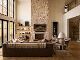 Living Room featuring statement hand-chiselled limestone fireplace