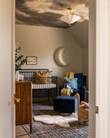Kids Room, Neutral Gender, Bed, Toddler Age, Rockers, Night Stands, Medium Hardwood Floor, and Bedroom Room Type Nursery   Photo 6 of 24 in Project New House Old Charm by West of Main