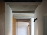 Hall detail, concrete ceiling.