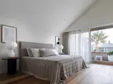 Main bedroom with balcony.