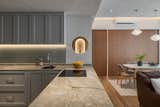 Kitchen, Accent Lighting, Cooktops, Open Cabinet, Stone Counter, Drop In Sink, Ceiling Lighting, Granite Counter, Vinyl Floor, Recessed Lighting, and Laminate Cabinet Dry kitchen  Photo 2 of 15 in Apartment @ 338A by KNQ Associates