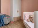 Kids Room, Vinyl Floor, Bed, Bedroom Room Type, Girl Gender, and Toddler Age Toddler's room  Photo 4 of 15 in Apartment @ 338A by KNQ Associates