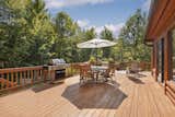 Outdoor, Large Patio, Porch, Deck, Trees, Shrubs, Flowers, Wood Patio, Porch, Deck, and Back Yard Terrace 1  Photo 4 of 32 in Pure Michigan Chalet by Luxury Living International