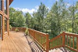 Outdoor, Wood Patio, Porch, Deck, Gardens, Back Yard, Large Patio, Porch, Deck, Grass, Flowers, Trees, and Shrubs Terrace 3  Photo 6 of 32 in Pure Michigan Chalet by Luxury Living International