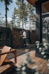 Outdoor wood storage and privacy fence