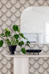 Schumacher wallpaper and vintage vessel 