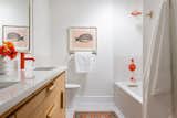 Raid tile & Jaclo fixtures in coral 