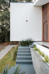 Stairs and main entrance  Photo 6 of 17 in Trapezium House by Studio Kunz
