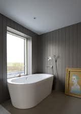 Bath Room, Ceramic Tile Floor, Ceiling Lighting, and Freestanding Tub  Photo 6 of 7 in Bavent House by Hudson Architects