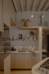 Kitchen, Light Hardwood Floor, Pendant Lighting, Concrete Counter, Concrete Backsplashe, Wood Counter, Wood Cabinet, Vinyl Floor, and Undermount Sink Kitchen  Photo 5 of 26 in CASA ESTUDIO by Joel A Martínez V