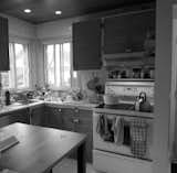 "Before" view of the kitchen.  Photo 11 of 16 in Résidence Lavigne by Passé Présent Design Durable