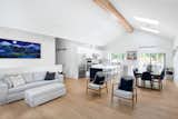 A vaulted ceiling, open concept and skylights makes this living space and obvious gathering place for the family.