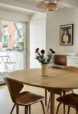 Dining Room, Bench, Ceiling Lighting, and Medium Hardwood Floor New open Kitchen and Dining Room. New Kitchen cabinetry and fixtures. Fenix NTM countertops, Laboratory custom cabinets.  Photo 9 of 16 in West Village Duplex I by STUDIO NN
