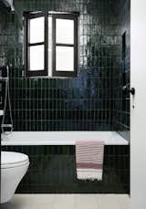 Main Bathroom Zellige tiles, custom window with reeded glass.