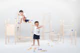 Zachari and Phoenix’s play

Zachari (3 years old) and Phoenix (5 years old) are brothers who joined us recently. Unlike Ame, they were very quick to engage with the structure. As an observer, the differences in their personalities were easily noticeable, as well as how the kids of three different ages interacted with the furniture, which was interesting to observe. Phoenix, the eldest, was fearless and quick to climb and sit on top. He began to play with the accessories and beams to see how he could fit elements into holes, experimenting and constructing. Zachari, on the other hand, was a bit scared to climb, so he started looking at each element individually and played with them. For a while, the beam served as a sword for him, but later he began exploring the spaces and niches within the system. Their play revealed different facets of their personalities and intelligences.