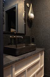 Bath Room, Recessed Lighting, Wall Mount Sink, Pendant Lighting, Accent Lighting, Vessel Sink, Medium Hardwood Floor, Wall Lighting, and Granite Counter What’s a powder room if not moody?  Photo 14 of 14 in Mod Mood by CG Studio Interiors