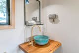Sink and faucet are from Turkey, placed on a live edge Redwood slab